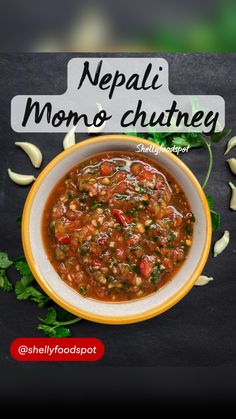 a bowl of soup on top of a table with the words nepal nomo chutney above it