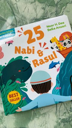 the children's book about nabi and rasul is sitting on a bed