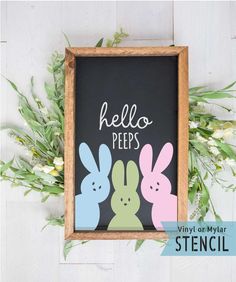 a chalkboard with three bunnies and the words hello pees on it