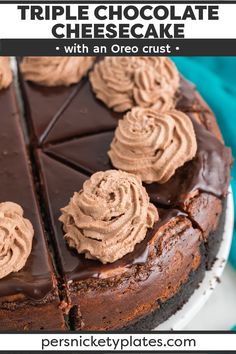 a triple chocolate cheesecake with an oreo crust