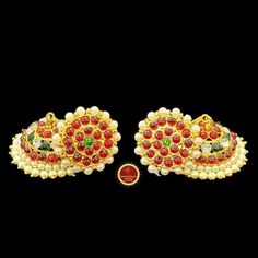 Design by Classical Dance Jewelry® ❥ Colorful and Designer traditional big pearl top and normal butta or jhumka Kemp temple Indian Jewelry Earrings in Red, Green stones combo ❥ Model no: EA-10 ❥ Age : 5 yrs and up ❥ You Can wear this set especially for Bharatnatyam And Kuchipudi Dance Performances and in Parties, Engagement, Weddings, Birthdays. ❥ Handmade Indian Item. ❥❥❥ Set includes ☛ Earrings pair ❇️ Imitation Jewelry by nature is little soft compared to real jewelry so little shape variatio Temple Jewelry Bridal Earrings With Stone Work, Ceremonial Temple Jewelry Bridal Earrings With Tilla, Bollywood Style Jhumkas For Puja, Bollywood Jhumkas For Puja, Bollywood Style Chandbali Jhumkas For Puja, Temple Jewelry Chandbalis With Stone Work For Navratri, Diwali Chandbalis With Zari Work For Puja, Ceremonial Diwali Temple Bridal Earrings, Temple Style Chandbalis With Zari Work For Puja