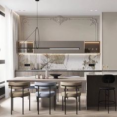 a modern kitchen with marble counter tops and stools