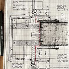 a drawing of a plan for a house on top of a piece of construction paper