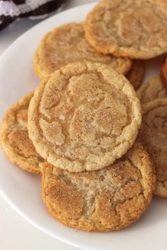 a white plate topped with cookies on top of a table