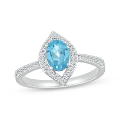 Show off your favorite gemstone in sparkle with this captivating ring. Crafted in sterling silver An oval-cut Swiss blue topaz is accentuated by an open marquise-shaped frame of white lab-created sapphires More white lab-created sapphires add shimmer to the slender shank Blue Topaz Marquise Cut Gemstone Jewelry, Marquise Cut Blue Topaz Ring, Marquise Cut Blue Topaz Gemstone Jewelry, Marquise Blue Topaz Jewelry With Center Stone, Blue Topaz Marquise Jewelry With Center Stone, Frame Ring, White Lab, Swiss Blue Topaz, Ring Sterling Silver