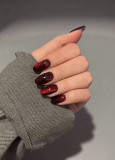 Black And Red Magnetic Nails, Red Cats Eye Nails Design, Black Nails Red Sparkle, Cherry Cola Cat Eye Nails, Black And Red Cats Eye Nails, Red And Black Magnetic Nails, Dark Red Cats Eye Nails, Cat Eye Dark Red Nails, Cat Eye Nails Fall Colors