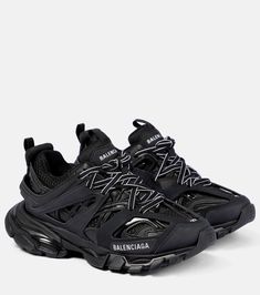 Track sneakers in black - Balenciaga | Mytheresa Tenis Balenciaga, Balenciaga Track Black, Balenciaga Track Trainers, Balenciaga Trainers, Balenciaga Track Sneakers, Track Sneakers, Balenciaga Shoes Sneakers, Pretty Sneakers, Rubber Sneakers