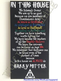 a harry potter house sign with the words in this house written on it's side