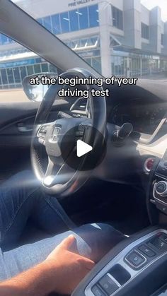 a man driving a car with the text at this beginning of your driving test