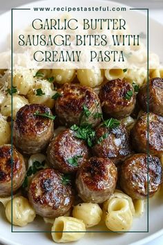 garlic butter sausage bites with creamy pasta in a white bowl on top of a table