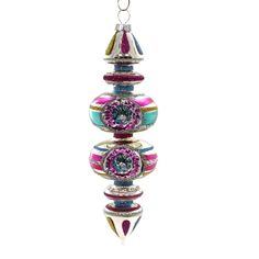 a multicolored glass ornament hanging from a chain