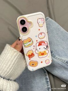 someone is holding up their phone case with cute animals on it