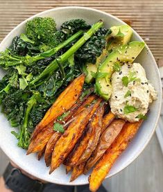 a white plate topped with different types of vegetables