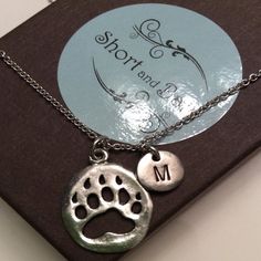 Bear Paw Print Necklace bear paw necklace initial necklace | Etsy Silver Paw Print Jewelry For Personalized Gift, Personalized Silver Jewelry With Paw Print, Silver Jewelry With Paw Print For Personalized Gift, Mother's Day Silver Jewelry With Paw Print, Silver Jewelry With Paw Print For Mother's Day, Bear Paw Print, Paw Necklace, Paw Print Necklace, Silver Monogram