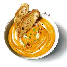 a bowl filled with soup and two pieces of bread sticking out of it's side