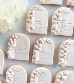 wedding cookies decorated with pink and white frosting