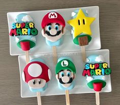 some super mario cake pops are on a plate