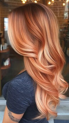 Add volume and depth to your hair with peachy copper layers that stand out. Discover more voluminous hairstyles on our website. Don’t forget to save this pin for your next layered hair transformation! Copper Reverse Balayage, Copper And Blonde Balayage, Voluminous Hairstyles, Cooper Hair, Pampered Princess, Hair Formulas, Copper Hair Color Ideas, Peach Hair Colors, Ginger Color