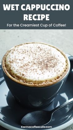 a cappuccino in a blue cup on a saucer