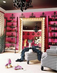 a living room filled with furniture and a chandelier