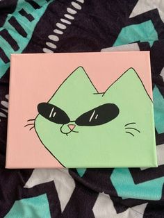 a painting of a green cat with sunglasses on it's face and black eyes