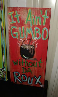 a sign that says it aint gumbo without da roux