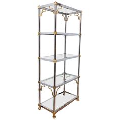 a metal and glass shelf with four shelves