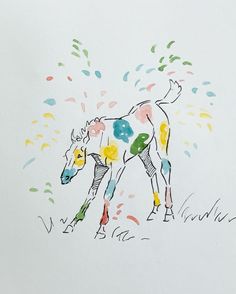 a drawing of a horse with colorful paint sprinkles on it