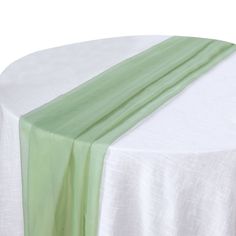 a white table with a green stripe on it