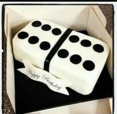 a cake in the shape of a domino board