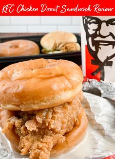 a chicken donut sandwich is stacked on top of each other