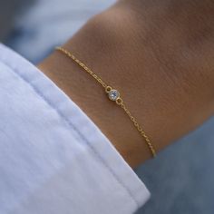 "Super cute bezel bracelet is great for layering or worn on its own! Delicate & dainty this is perfect for a minimalist look :) - - - D E T A I L S - - -  * Made of 925 Sterling Silver * THICK plating of 14k Gold or Rhodium  * Available in 6.25\", 6.75\" + .5\" Ext Chain lengths * 4mm Bezel * Nickel-free & Hypoallergenic  * Lobster clasp closure with extension chain  Bracelets on Model: TENNIS BRACELET --> https://www.etsy.com/listing/899893520/tennis-bracelet-gold-tennis-bracelet? click_key=7b87b1a3c5a7ba74e2318e00058ba68f4b95e9ad%3A899893520&click_sum=5ad98715&ga_search_query=tennis%2Bbracelet&ref=shop_items_search_3&pro=1&sts=1 Beaded Bracelet --> https://www.etsy.com/listing/1330606182/beaded-bracelet-dainty-bracelet?click_key=1ddd85cabdfc074c2afb8a761e05b152f0e045ab%3A1330606182&click Everyday Adjustable Diamond Bracelet With Bezel Setting, Adjustable Bezel Set Diamond Bracelet For Everyday Wear, Adjustable Bezel-set Diamond Bracelet For Everyday Wear, Dainty Adjustable Diamond Bracelet With Strap, Minimalist Everyday Bracelet With Bezel Setting, Minimalist Everyday Bracelets With Bezel Setting, Dainty Adjustable Bracelet With Bezel Setting, Dainty Chain Bracelet With Bezel Setting, Minimalist Adjustable Bracelets With Bezel Setting