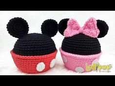 two crocheted mickey and minnie mouse hats are shown side by side with each other