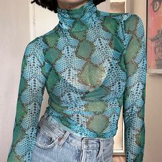 Sheer Green/ Blue Snakeskin Print Turtleneck. Size Xs. New With Tags Trendy Blue High-stretch Tops, Trendy High Stretch Blue Tops, Trendy Fitted Green Mesh Top, Blue Trendy Mesh Top For Spring, Trendy Blue Mesh Top For Spring, Blue High Stretch Summer Tops, Trendy Blue Mesh Top For Summer, Summer Blue Mesh Top, Blue Fitted Mesh Top Casual Style