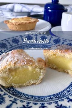 two pastries sitting on top of a blue and white plate