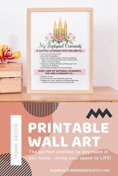 the printable wall art is displayed in front of a wooden box with flowers on it