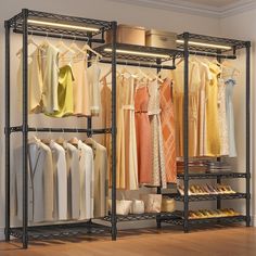 an open closet with clothes and shoes hanging on the racks, in front of a wooden floor