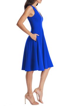 The signature drape of sleek crepe fabric brings a pleasing swing and sway to this elegant fit-and-flare dress featuring always-welcome pockets. 42" length (size Medium) Hidden back-zip closure Plunge neck Sleeveless On-seam pockets Lined 97% polyester, 3% spandex Machine wash, line dry Imported Flare Cocktail Dress, Fit And Flare Cocktail Dress, Rehearsal Dinner Dresses, Blue Sleeveless Dress, Dresses Xxl, Dress The Population, Crepe Fabric, Knee Length Skirt, Buy Dress