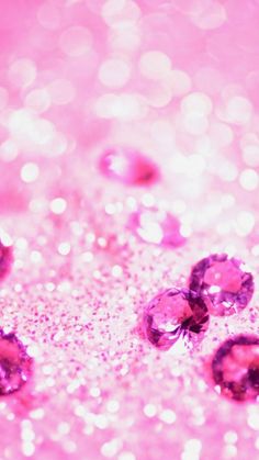 pink and gold glitter background with small diamonds