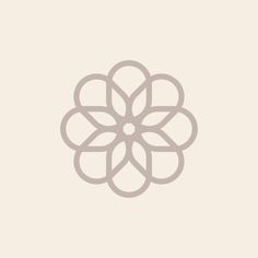 an abstract flower design on a beige background