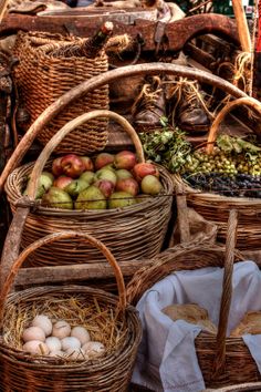 several baskets filled with different types of food