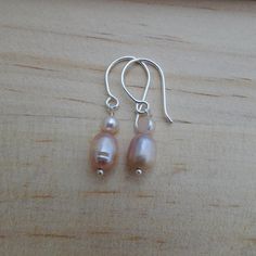 Pink pearl drop earrings with small pearl accent on sterling silver earrings