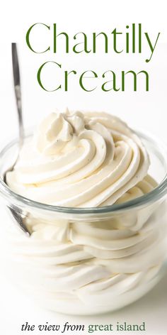 a bowl filled with cream sitting on top of a table