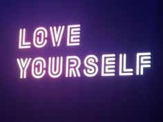 a neon sign that says love yourself in white letters on a purple background with the words'love yourself'lit up