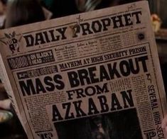 a newspaper with the words mass breakout from az'abaan on it sitting on a table