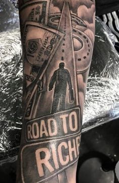 a man's arm with a sign that says road to richf on it