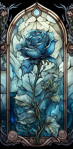 a stained glass window with a blue rose in it