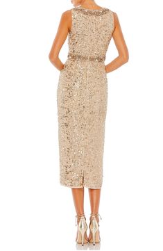 Capture looks—and hearts—in a sequin-adorned cocktail dress featuring a subtle back slit and stunning beaded embellishments at the neckline and waist. 44" length (size 8) Jewel neck Sleeveless Lined 100% polyester Spot clean Imported Asian Owned/Founded Gold Dress Cocktail, Elegant Gold Dress, Unique Cocktail Dress, Unique Cocktail Dresses, Tea Length Cocktail Dresses, Jewel Neck Dress, Cocktail Dress Elegant, Cocktail Length Dress, Gold Party Dress