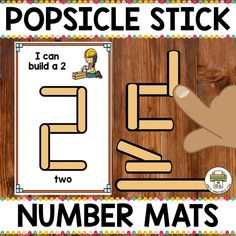 popsicle stick number mats with the word i can build a 2 in front of it