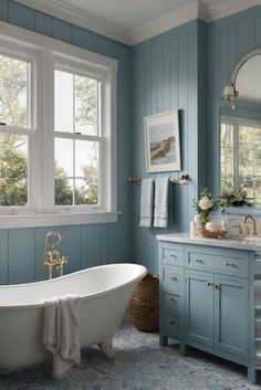 a bathroom with blue painted walls and white bathtub in the center, along with two windows